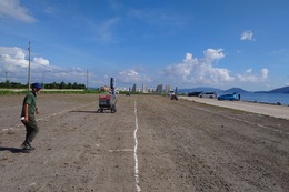翌日・第2駐車場の照明片付け(ホームページ委員会撮影) 翌日・第2駐車場の照明片付け